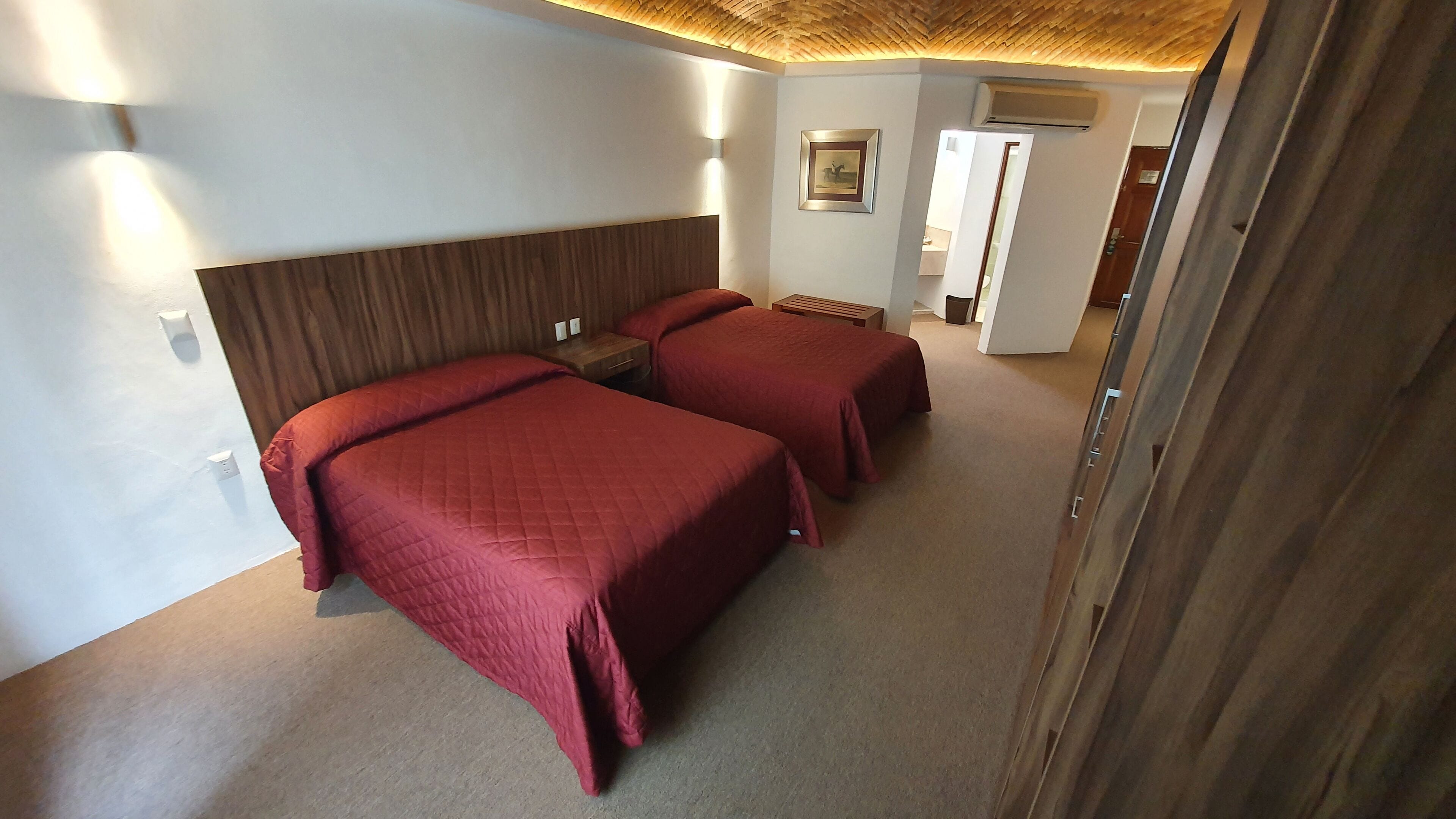 luxury room, 2 double beds, non smoking | in-room safe, desk, laptop workspace, blackout curtains