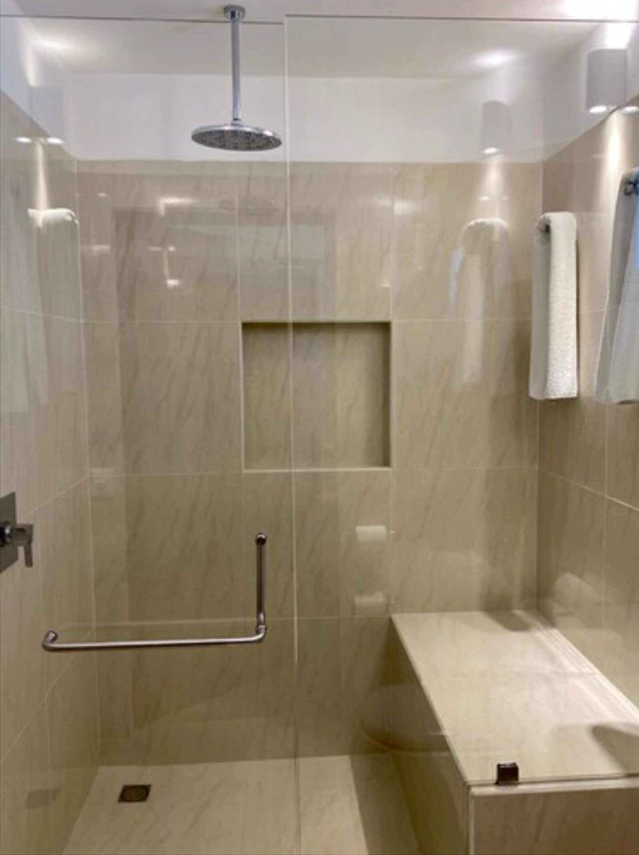 shower, free toiletries, hair dryer, towels