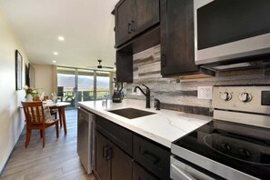 Fridge, microwave, oven, stovetop - NKH 605 Remodeled BeachFront w Pool AC Sandy Beach (Kihei)