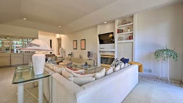 Smart TV, fireplace, table tennis, books