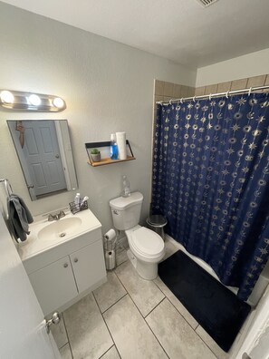 Shower, hair dryer, towels, soap