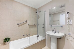 Combined shower/bathtub, hair dryer, towels, soap