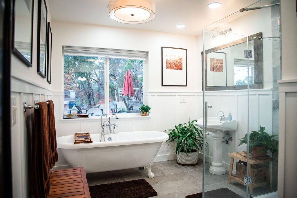 Bathtub, hair dryer, towels, soap