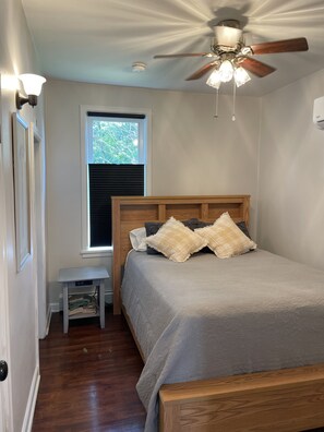 1 bedroom, desk, iron/ironing board, travel crib