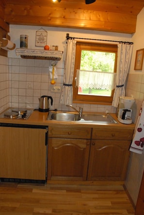 Fridge, stovetop, coffee/tea maker, toaster
