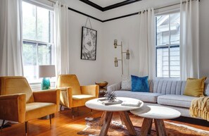 Smart TV, fireplace, books, offices