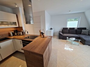 Fridge, oven, dishwasher, high chair