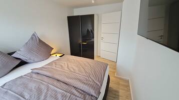 3 quartos, escrivaninha, berço de viagem, Wi-Fi