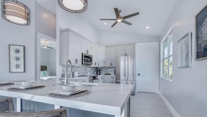 House, Multiple Beds | Private kitchen - Twin Palaces on Palmetto by Coastal Vacation Properties (Fort Myers Beach)