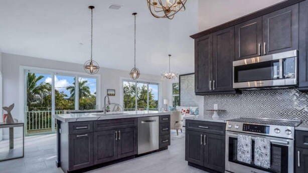 House, Multiple Beds | Private kitchen - Twin Palaces on Palmetto by Coastal Vacation Properties (Fort Myers Beach)