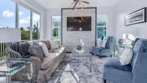 House, Multiple Beds | Living room - Twin Palaces on Palmetto by Coastal Vacation Properties (Fort Myers Beach)