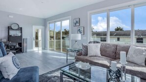 House, Multiple Beds | Living room - Twin Palaces on Palmetto by Coastal Vacation Properties (Fort Myers Beach)