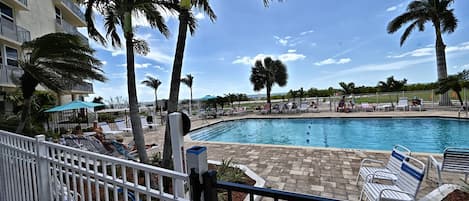 A heated pool, pool loungers