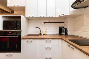 Apartment | Eigene Küche | Kühlschrank, Mikrowelle, Herdplatte, Hochstuhl