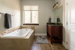 Bathtub, hair dryer, towels