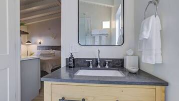 Shower, eco-friendly toiletries, hair dryer, towels