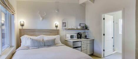 Iron/ironing board, travel crib, free WiFi, bed sheets