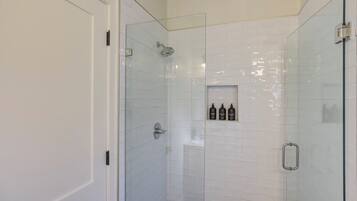 Shower, eco-friendly toiletries, hair dryer, towels