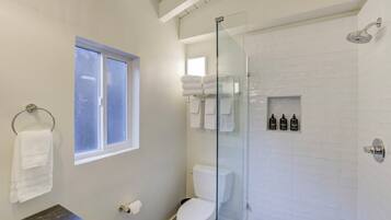 Shower, eco-friendly toiletries, hair dryer, towels