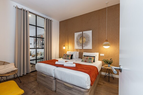 2 عدّة غرف نوم ومكواة/لوح كي وواي فاي مجانًا وملاءات أسرّة