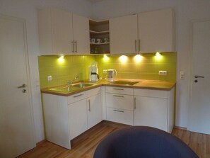 Fridge, stovetop, dishwasher, coffee/tea maker - Haus Amrum - Located east village on the dunes: FeWo1 * look, book, experience * (Juist)