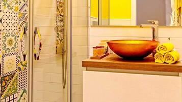 Shower, hair dryer, bathrobes, towels