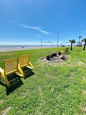 On the beach, sun-loungers