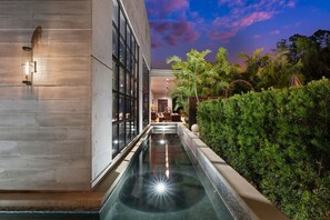 Outdoor pool, a heated pool - ✰ Entire Naples Estate: sleeps 30, 150' Pool Tennis Pickleball Bocce Gym Theater (Naples)