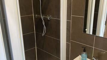 Apartment | Bathroom | Separate bathtub and shower, deep-soaking bathtub, hair dryer, towels
