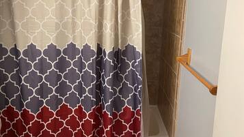 Combined shower/tub, hair dryer