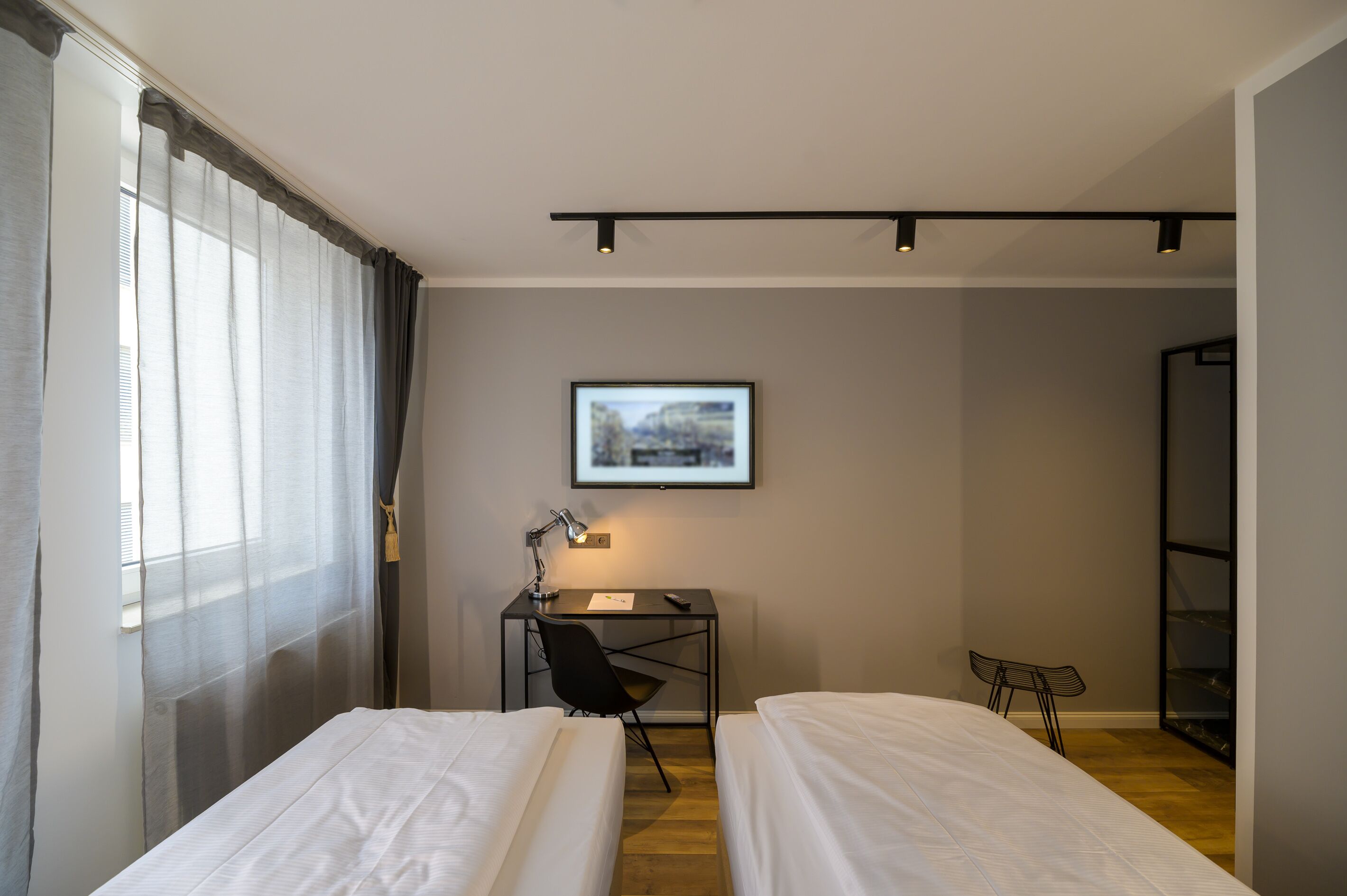 twin room | hypo-allergenic bedding, desk, blackout curtains, soundproofing