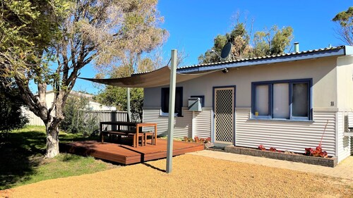 Welcome to the Blue Beach House, a quaint beach shack and beautiful ocean front property in an exclu