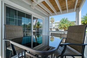Outdoor dining - Island Place 101 Dreamy Condo with Pool! Rebuilt! (Cedar Key)