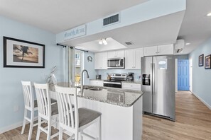 Fridge, microwave, oven, stovetop - Island Place 108 Beachfront Poolside Pet-Friendly! (Cedar Key)