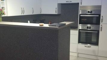 Apartment | Private kitchen | Fridge, microwave, oven, stovetop