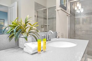 Bathtub, hair dryer, towels, soap