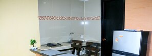 Standard Loft, Sea View | Private kitchen | Fridge, microwave, dishwasher, coffee/tea maker