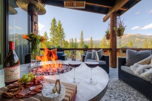 Enjoy some relaxation on the cozy deck - Stunning Retreat w/ Views, Privacy+Amenities Galore-Rent for Entire Ski Season! (Big Sky)