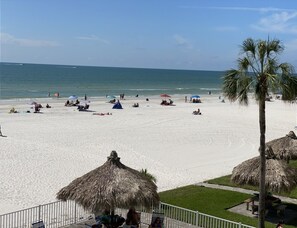 On the beach, sun loungers, beach towels