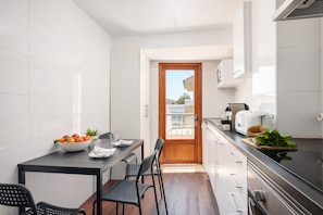Fridge, microwave, oven, stovetop - BLAU BLUE 2 - Modern apartment facing the sea in Can Picafort. Free WIFI. (Ca������n Picafort)