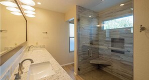 Combined shower/tub, hair dryer, towels, soap