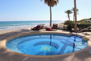 A pool with a view of the beach and ocean. - Tessoro #1002 at Las Conchas – Elevated Luxury on the Sea of Cortez (Puerto Peñasco)