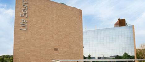 A building with a large sign reading "Life Source" and a modern glass facade.