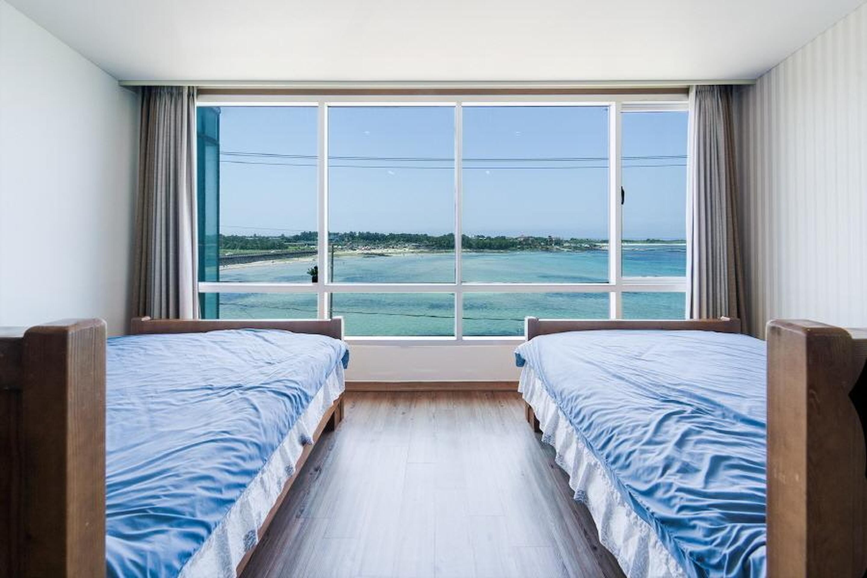 غرفة بتجهيزات أساسية - غرفة نوم واحدة (udo(Family Room/ocean view)) | 1 غرفة نوم وواي فاي مجانًا