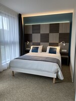 Quarto premium | Roupas de cama premium, Wi-Fi de cortesia, roupa de cama