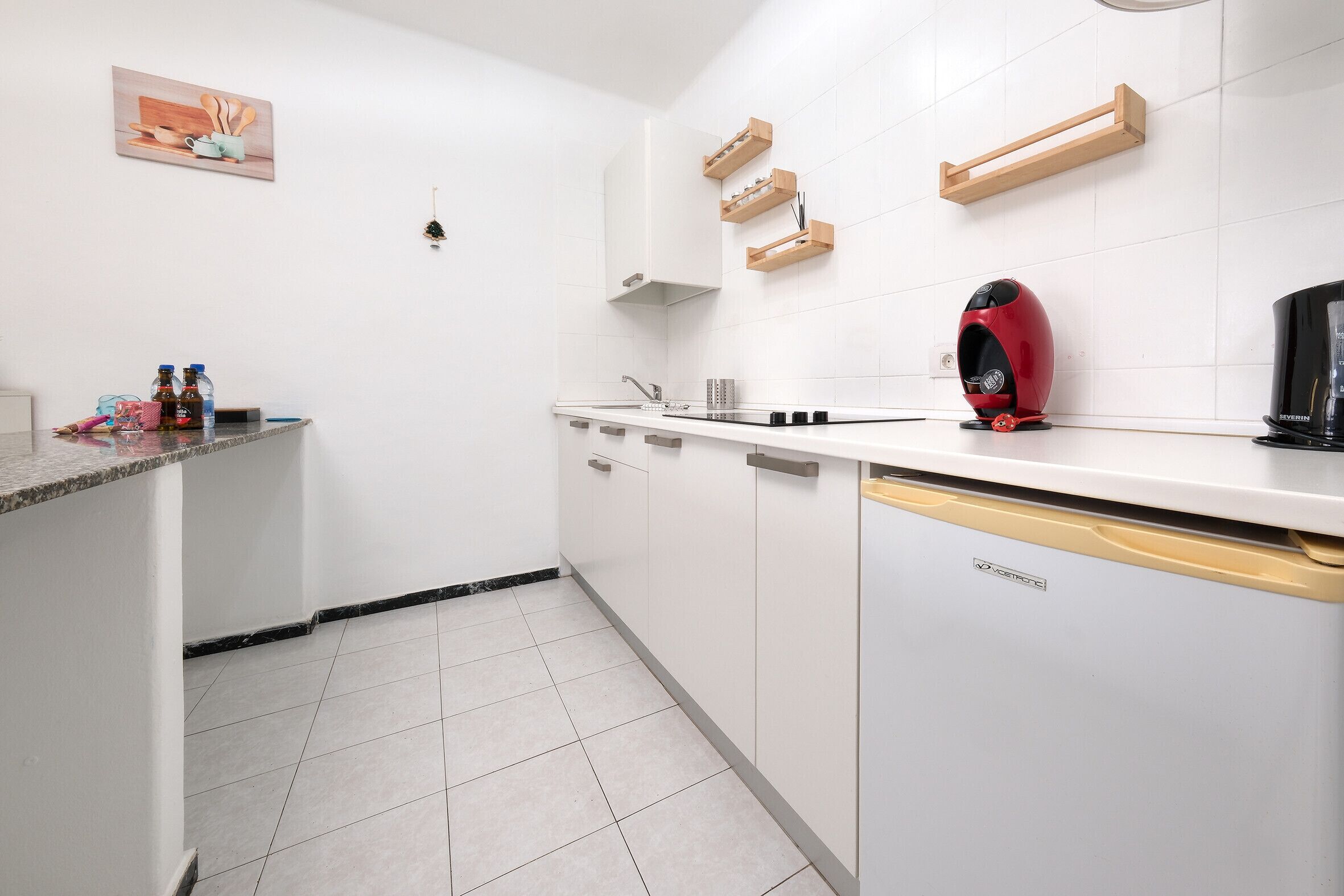 Fridge, microwave, stovetop, coffee/tea maker