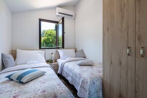 2 多间卧室、客房内保险箱、熨斗/熨衣板、免费 WiFi