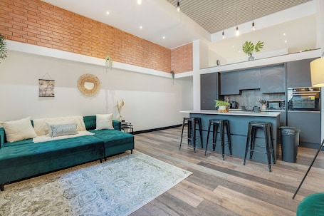 Premium Apartment, 1 Bedroom | Living area | 50-inch Smart TV with digital channels, Netflix, streaming services