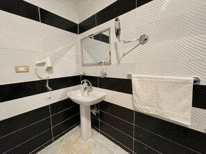 Apartemen Deluks | Kamar mandi | Handuk dan sabun