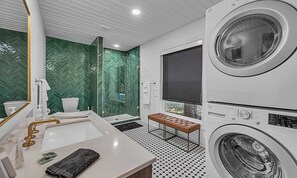 Bathtub, hair dryer, shampoo